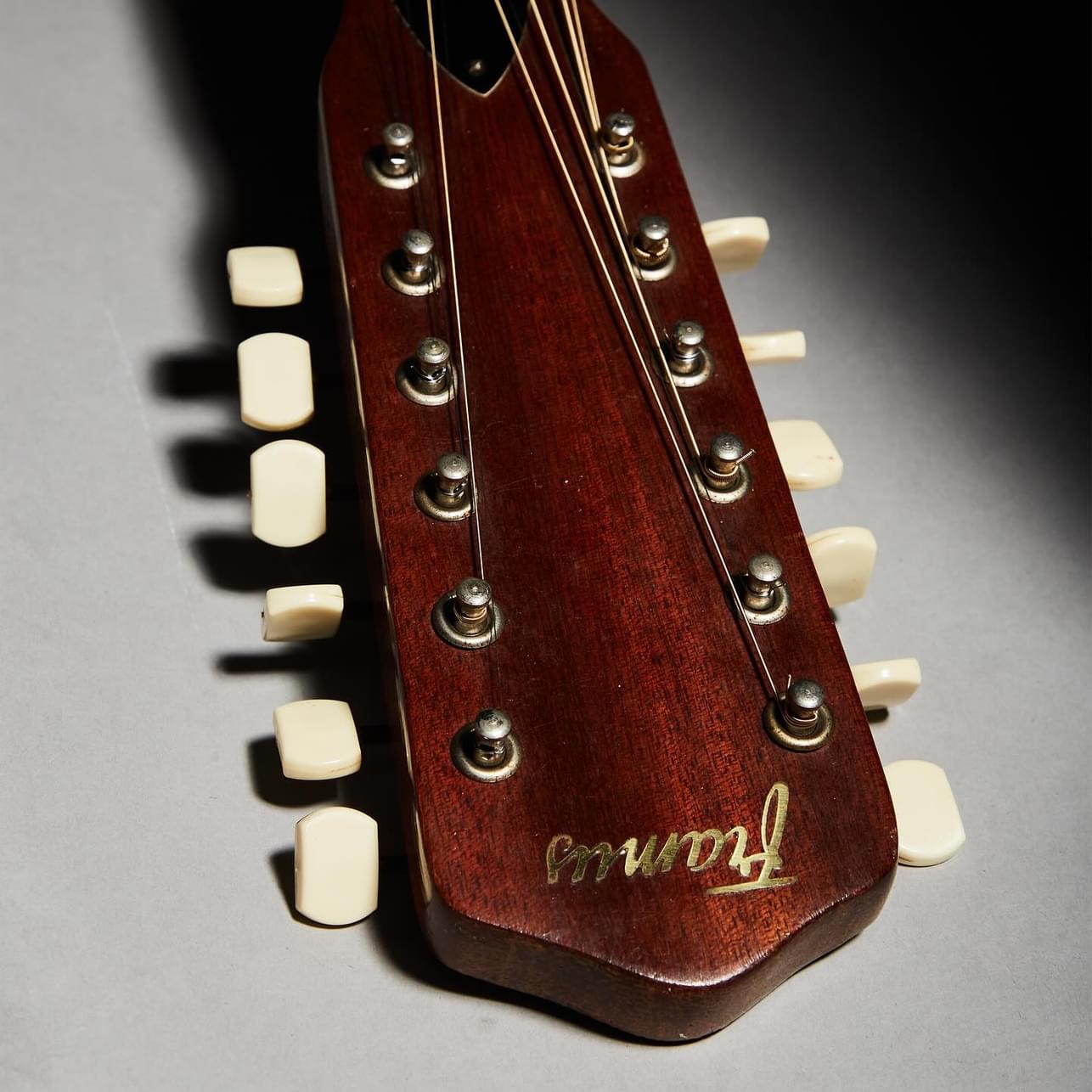 Close-ups of the guitar, and the photo book it comes with, "The Beatles: Photographs from the Set of 'Help!'" book by Emilio Lari