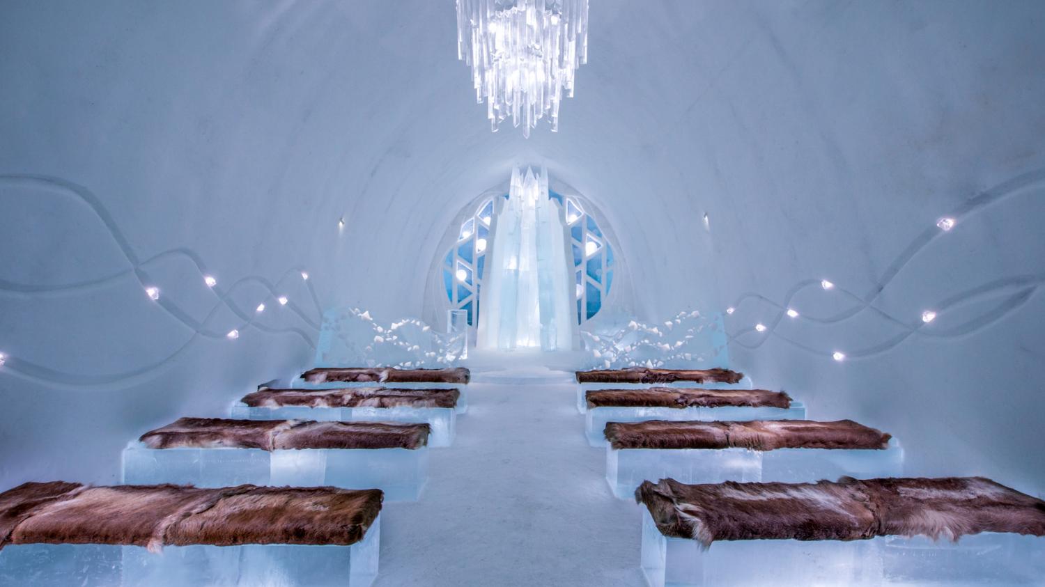 The ice ceremony hall is the perfect venue for an intimate winter wonderland wedding/