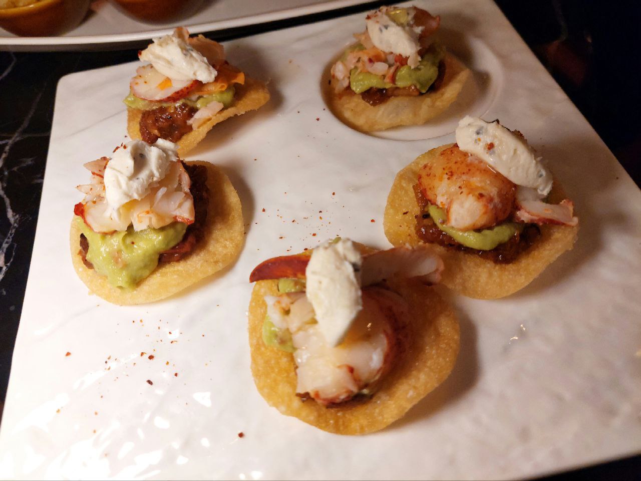 LEFT: Lobster Cold. RIGHT:  USDA Beef Cheek and Truffle Macchiato.