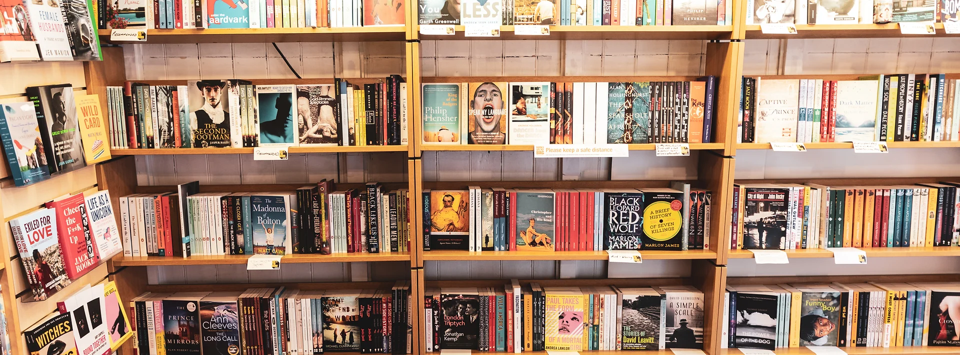 Visitors can find a collection of LGBTQ+ titles or books written by queer writers within the shop