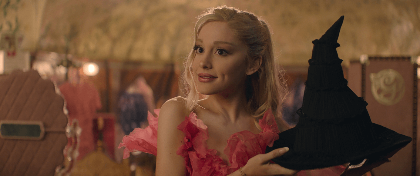 Ariana Grande as Glinda in the featurette