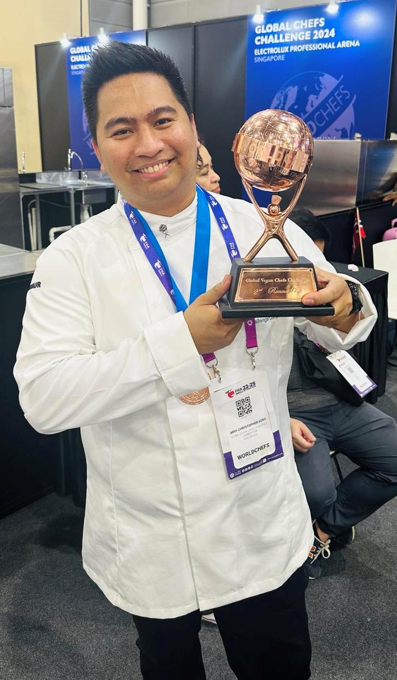 Chef AC Agra with the bronze trophy Philippine LTB Culinary