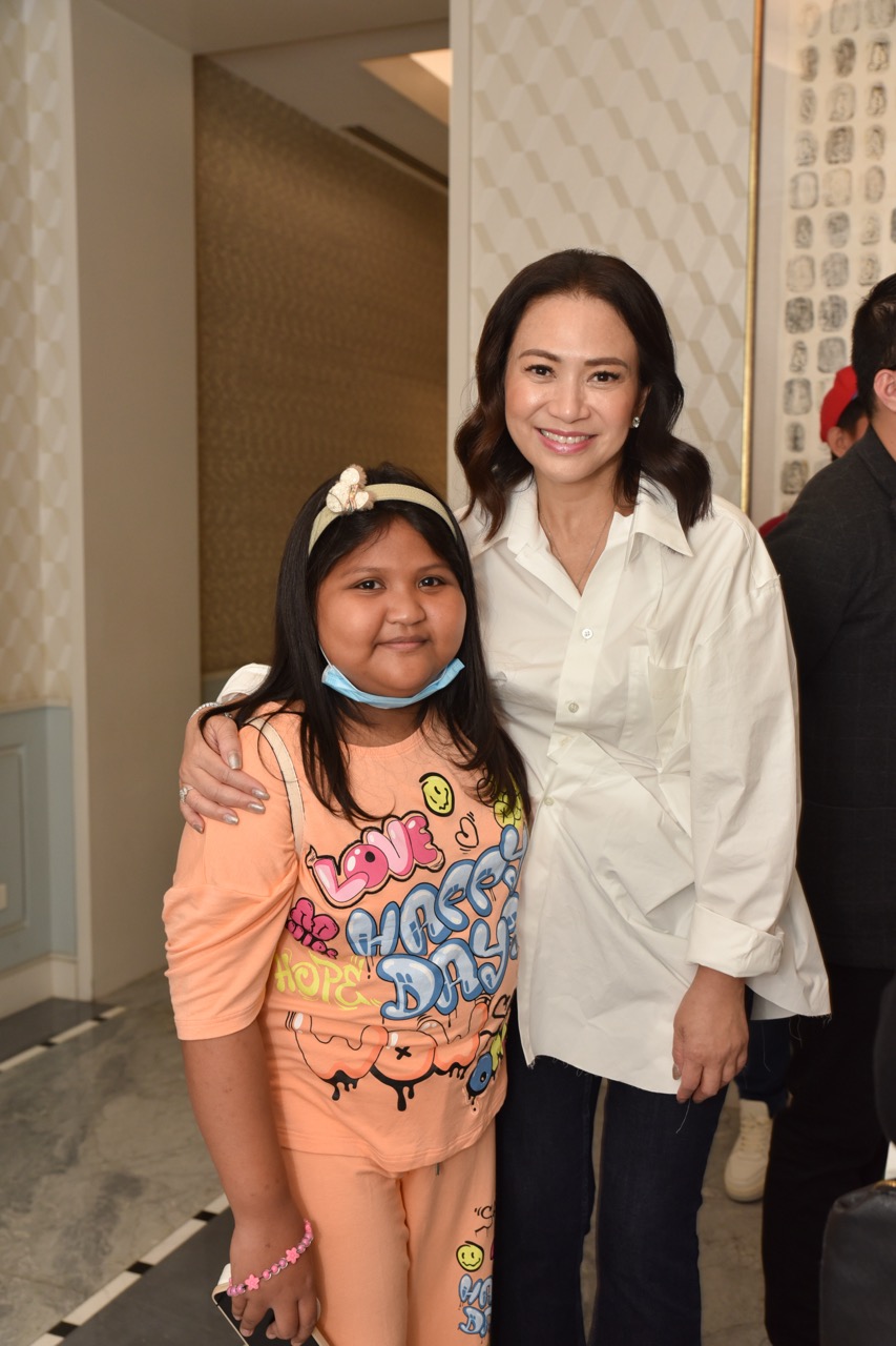 Sheila Romero with pediatric cancer survivors during the event